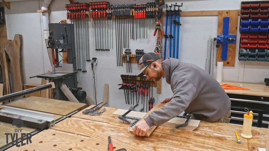man assembling half-lap joint pieces