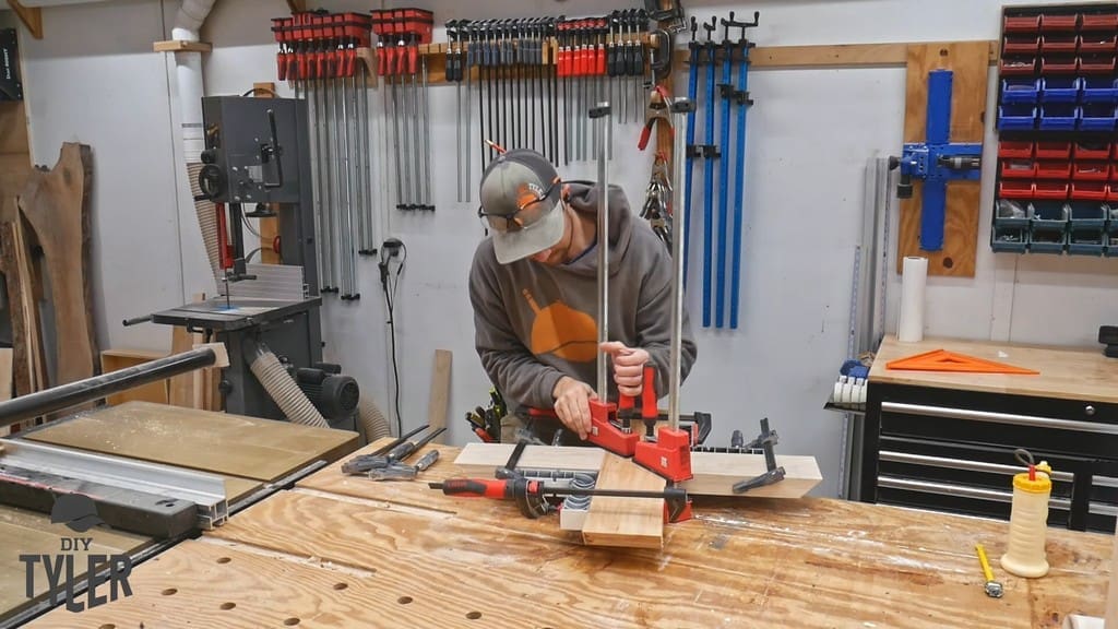 man clamping top pedestal bracket piece